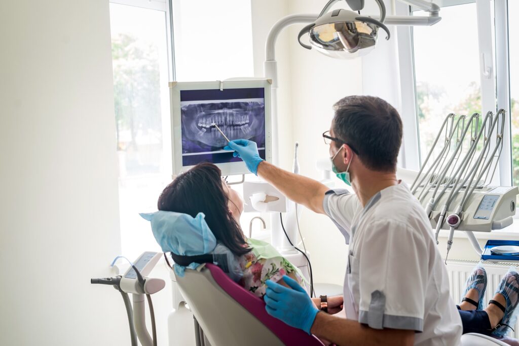 a doctor reviewing an xray with his patient