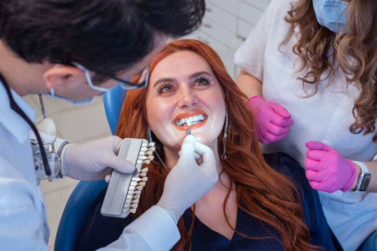 a woman being examined for dental veneers